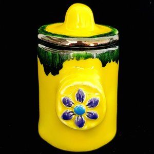 Handmade Small Ceramic Stash Jar in Bright Yellow with a Blue Flower